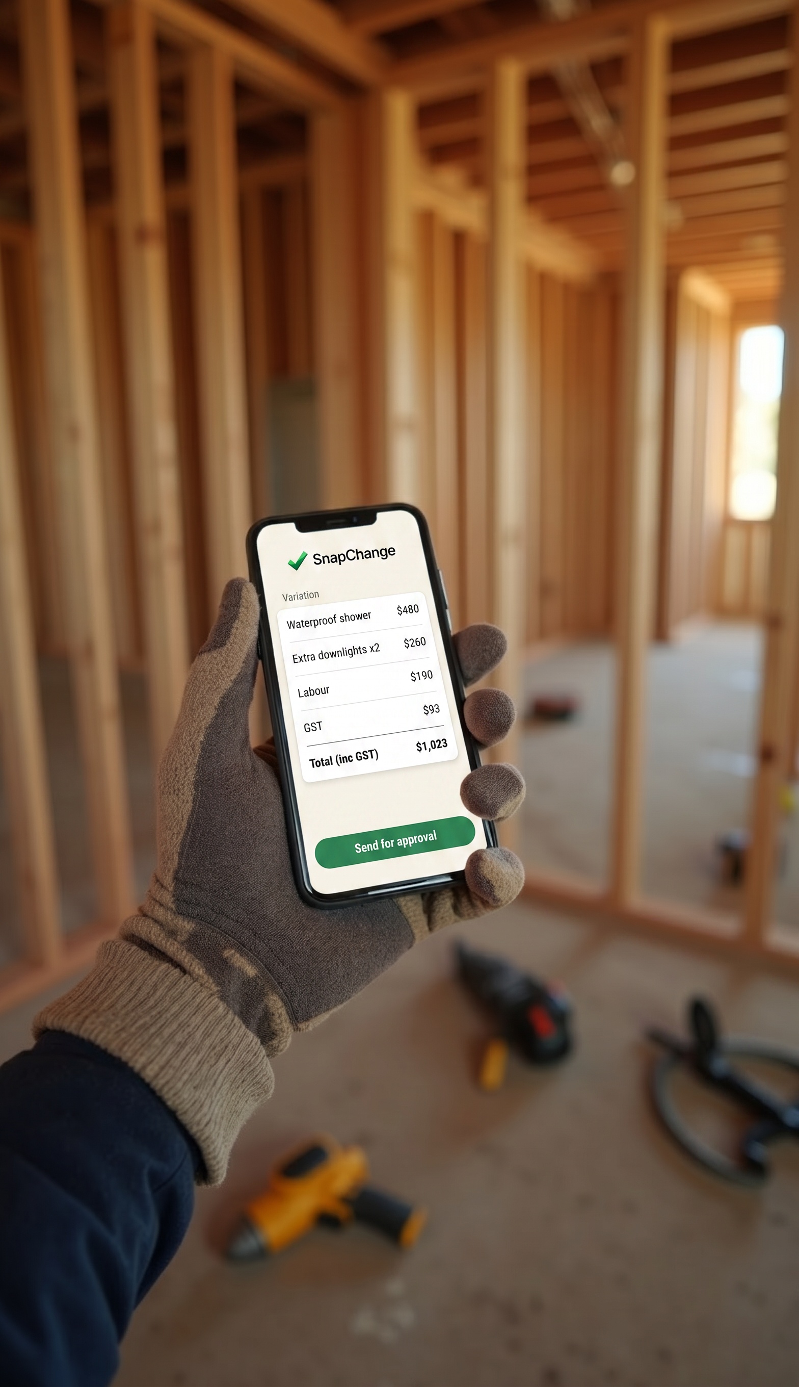 A tradesperson holding a phone showing a SnapChange variation of $1,023 including GST on a job site